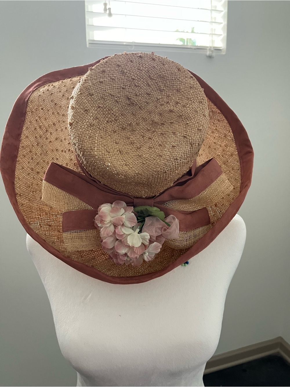 Straw Sun Hat with Mauve Trim and Floral Accent